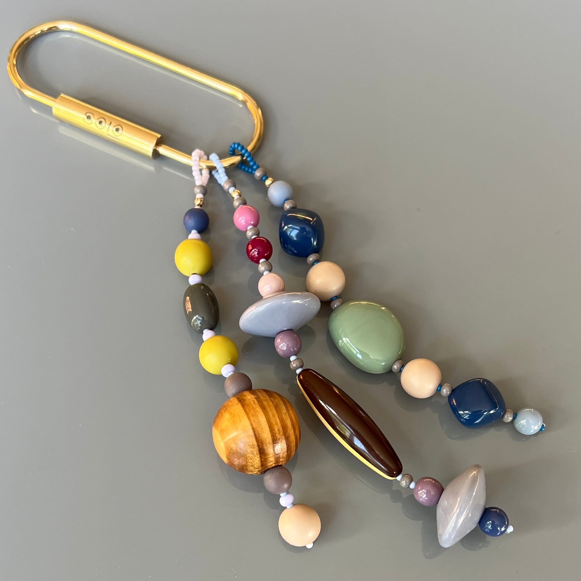 Vibrant Czech glass beads, natural wooden beads, and vintage acrylic beads, combined for a unique, earthy look.