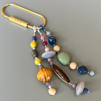 Vibrant Czech glass beads, natural wooden beads, and vintage acrylic beads, combined for a unique, earthy look.