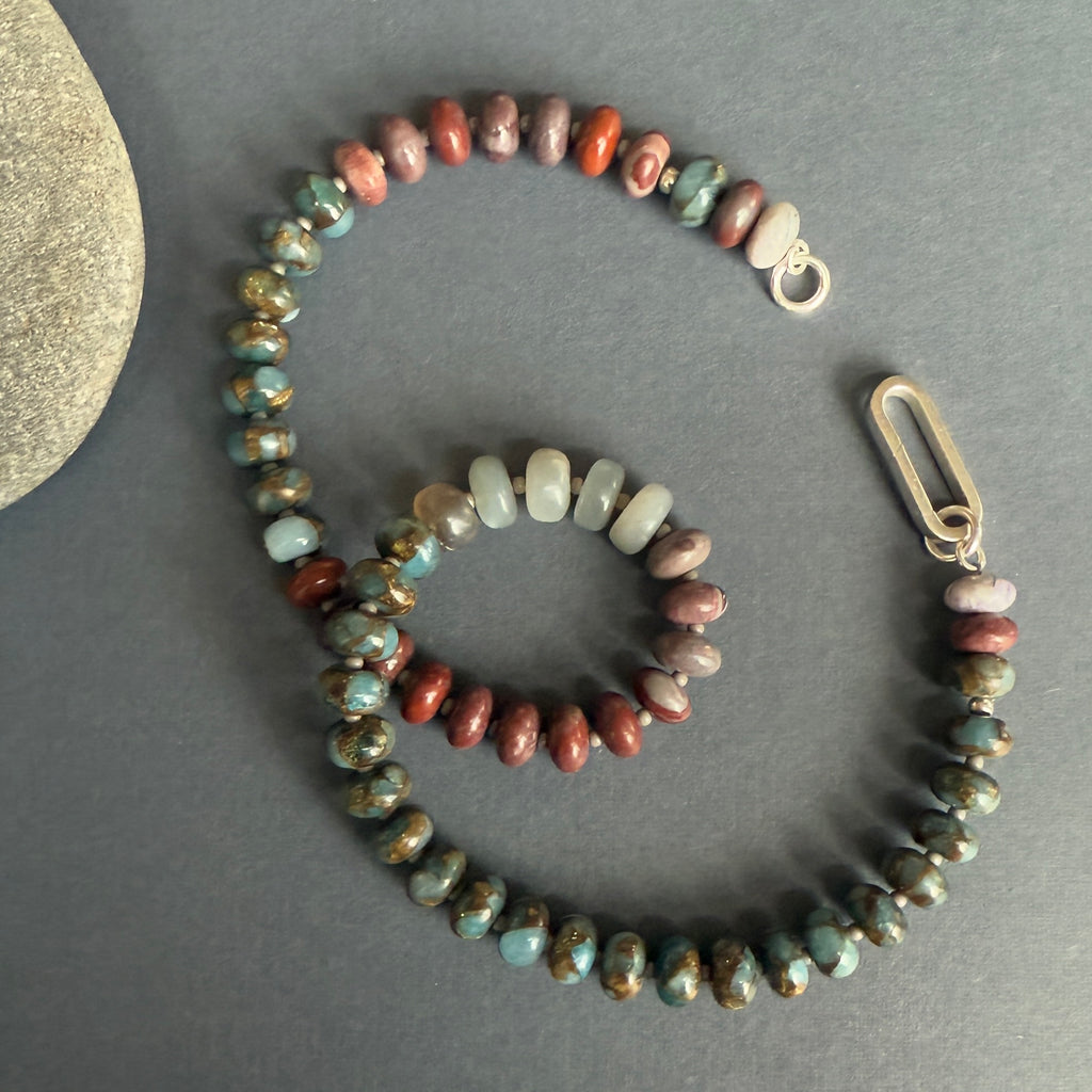 This handcrafted gemstone necklace features Jasper and Moonstone, finished with a 14K gold or sterling silver clasp for a refined look. Ideal for layering or wearing alone.