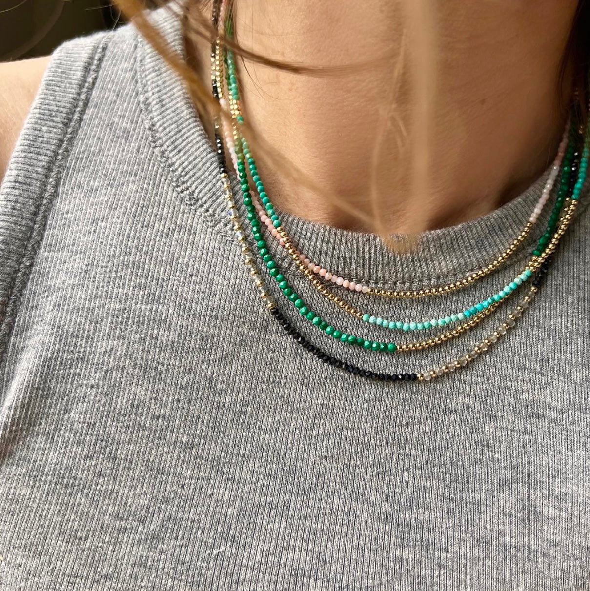 Handcrafted faceted malachite necklace with 14K gold accents, perfect for layering or wearing solo for an elegant, fashion-forward style.