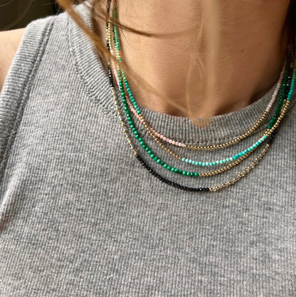 Handcrafted faceted malachite necklace with 14K gold accents, perfect for layering or wearing solo for an elegant, fashion-forward style.