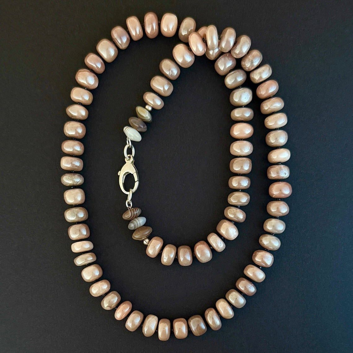 Elegant necklace with hand-strung moonstone and agate gemstones, featuring a premium sterling silver or 14k gold clasp, perfect for layering or wearing solo
