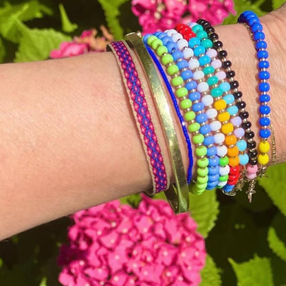 Fresh and vibrant Lavender + Light Jade bracelet with 14K gold-filled accents, a tarnish-resistant piece that adds a touch of joy to any outfit.