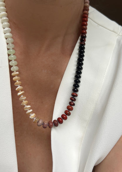 A timeless necklace combining mother of pearl, black and white onyx, and chalcedony gemstones, accented by Czech glass beads for a touch of color.