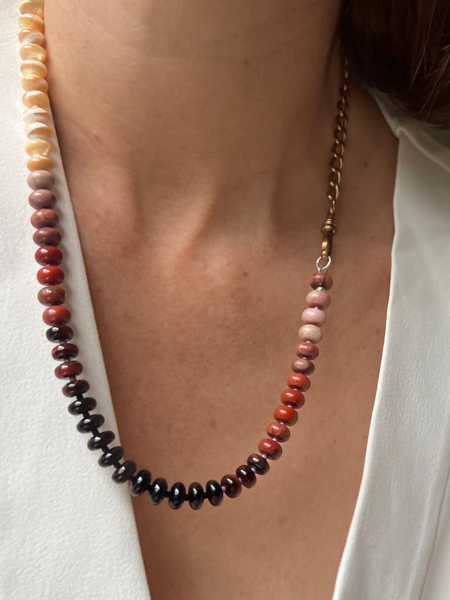 A versatile necklace with a harmonious blend of mother of pearl, onyx, chalcedony, and Czech glass, perfect for casual and beach-inspired looks.