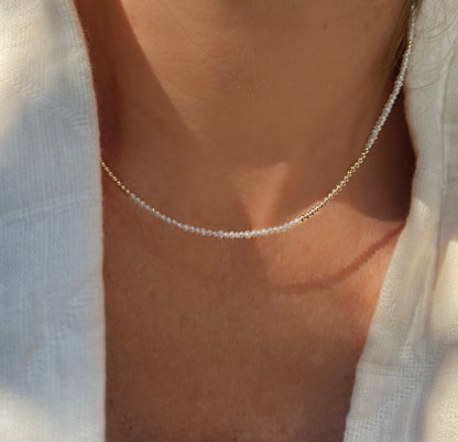 Handcrafted baroque pearl necklace with 14K yellow gold beads, offering a unique, organic look perfect for both everyday wear and special occasions.