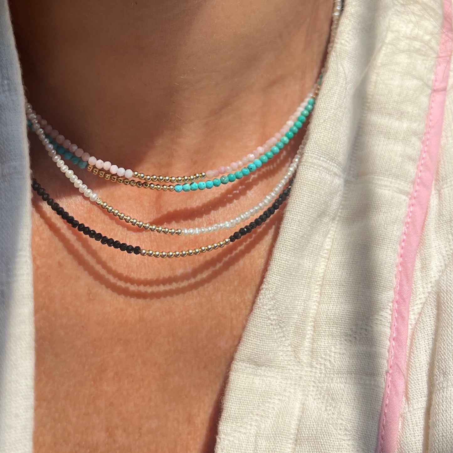 Delicate baroque pearl and 14K gold beaded strand, handcrafted for a versatile and unique piece, ideal for layering or wearing solo.