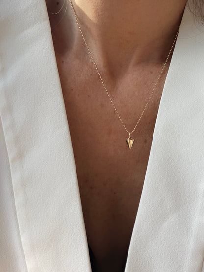 With a meaningful triangular charm, the Zenith Petite Necklace represents unity, growth, and balance. Handcrafted in NYC, it’s available in 14K gold or sterling silver for lasting elegance.