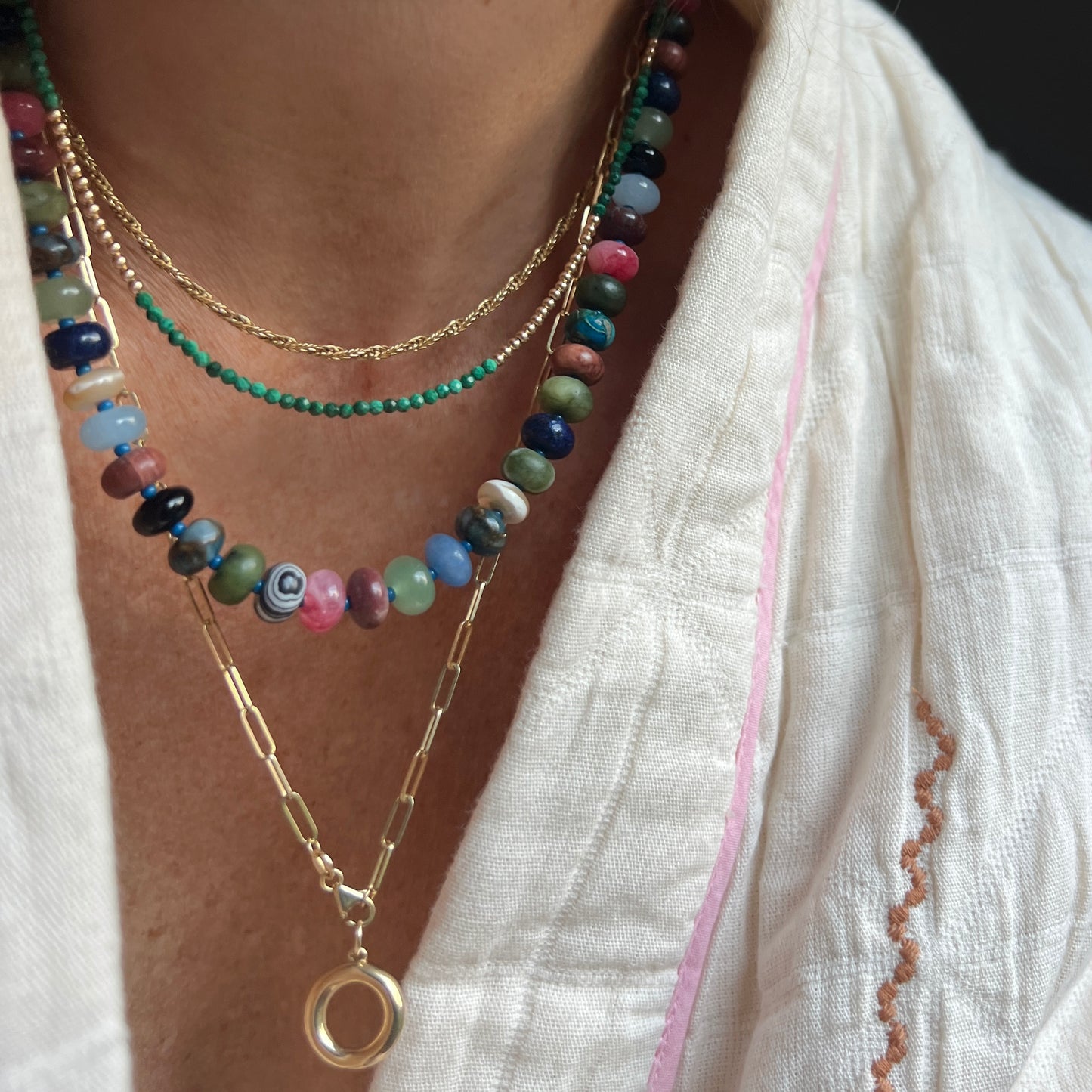 Timeless malachite gemstone necklace with 14K gold beads, crafted with attention to detail for a polished and durable finish.