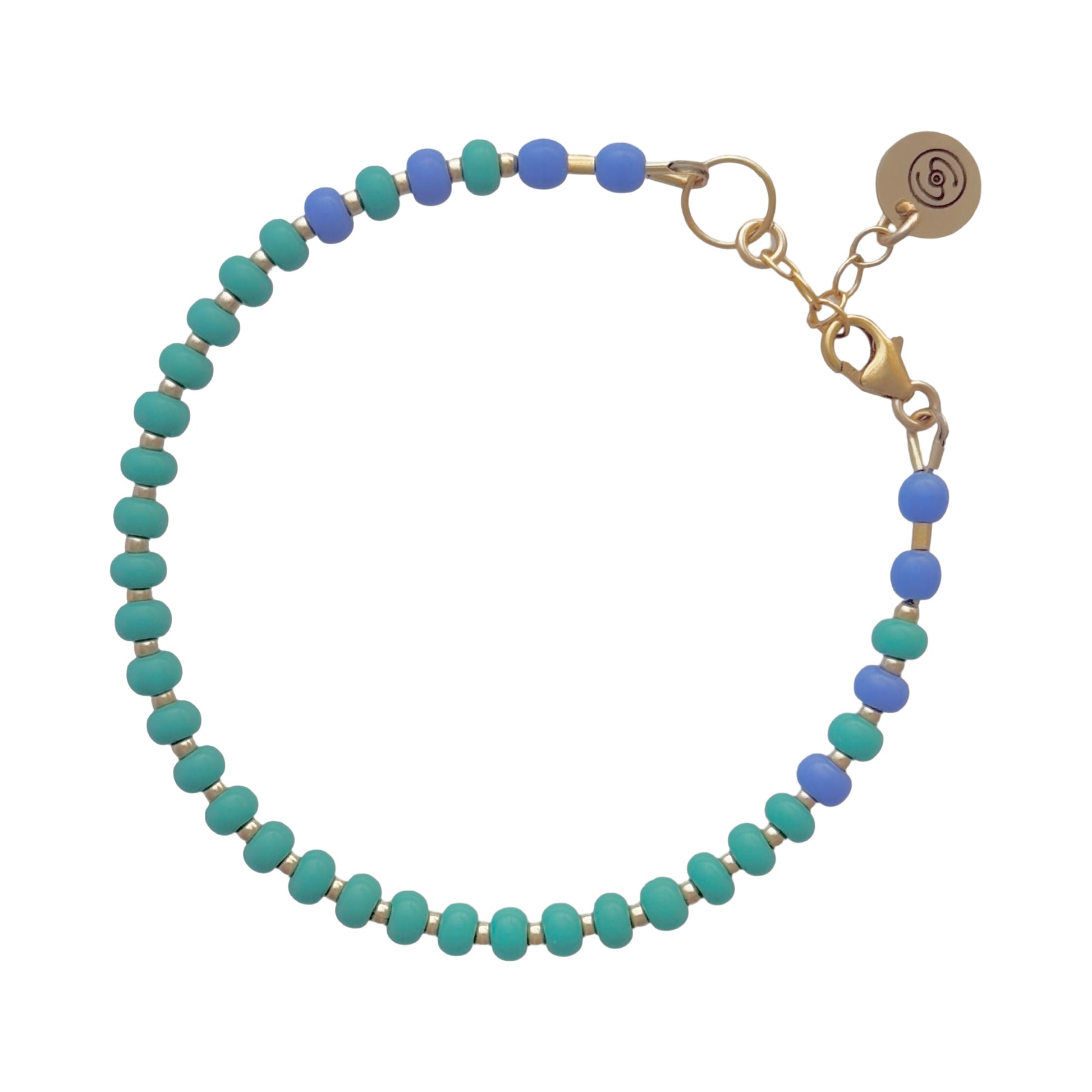 Delicate and durable Light Jade + Periwinkle bracelet, crafted with high-quality Czech glass beads and tarnish-resistant 14K gold-filled findings for lasting elegance.
