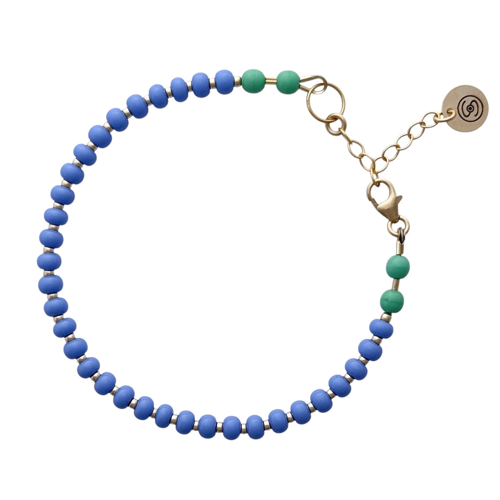 Sophisticated Lavender + Light Jade bracelet, designed with soft pastel hues and 14K gold-filled accents, perfect for adding a touch of elegance to your look.