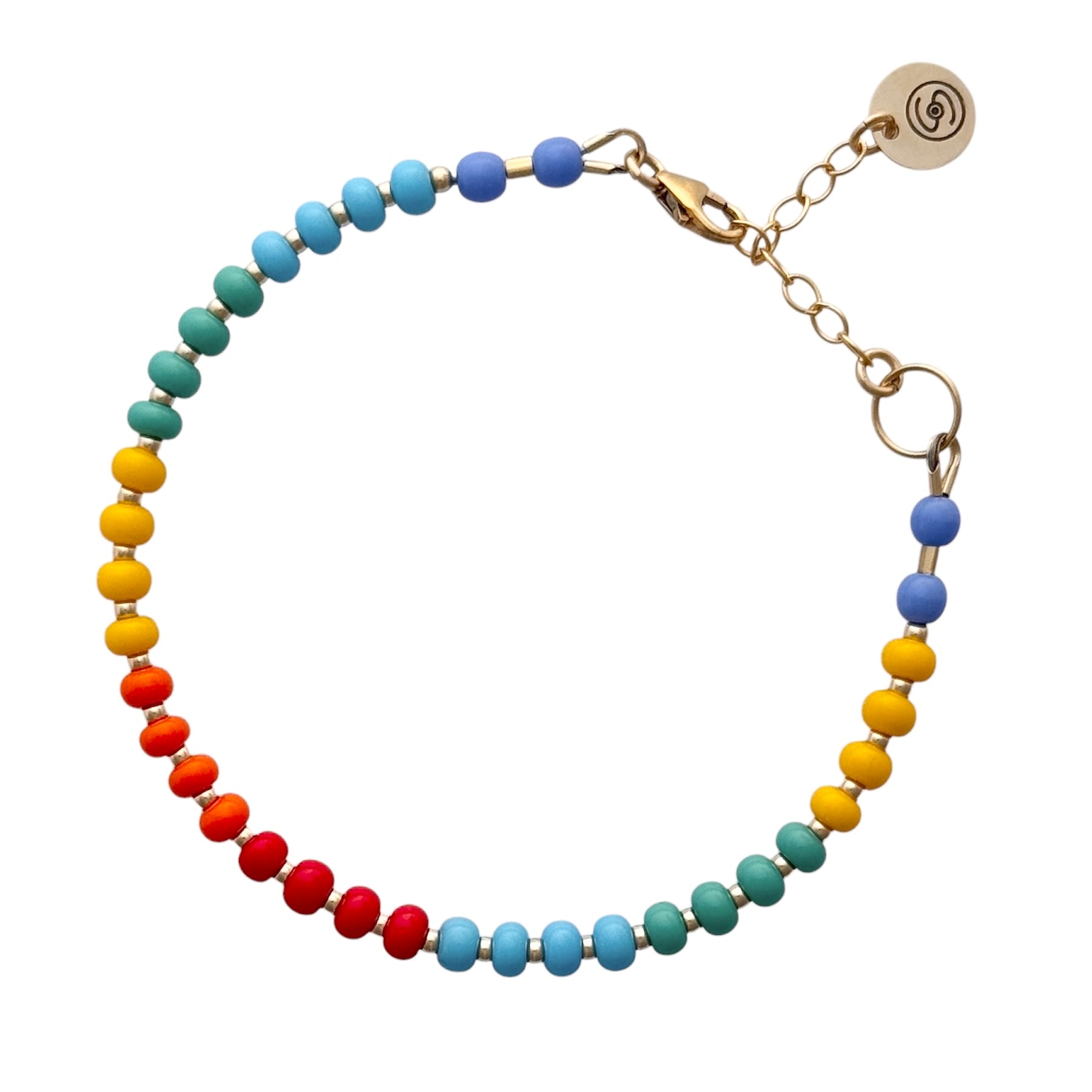 Bright and cheerful, this handcrafted Rainbow HAPPY Bracelet showcases a mix of multicolored Czech glass beads with luxurious gold-filled details.