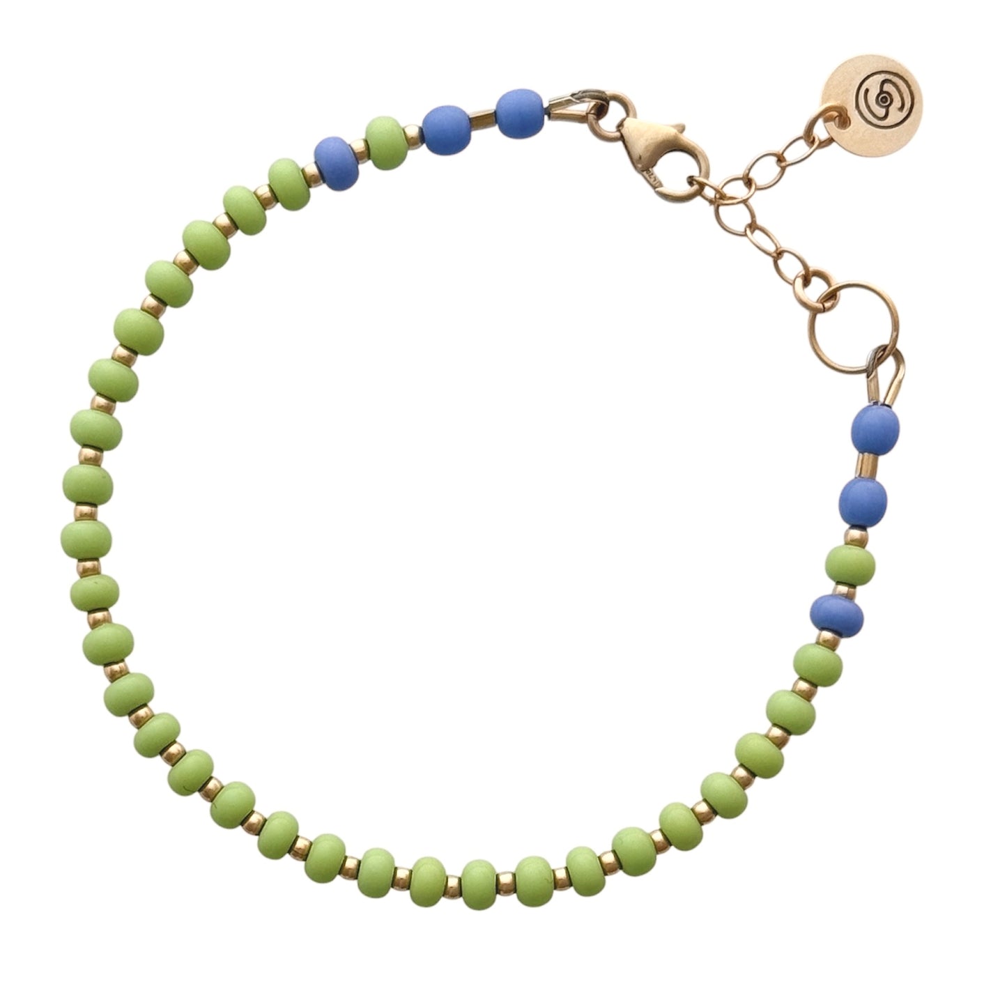 Hand-strung with high-quality Czech glass beads, this Mint + Periwinkle bracelet is finished with tarnish-resistant 14K gold-filled beads for lasting beauty.