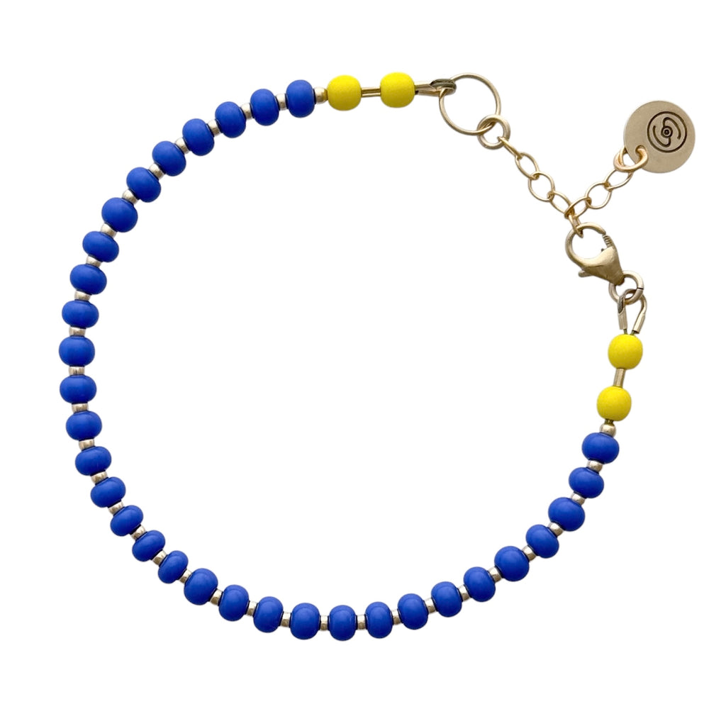 Joyful Periwinkle + Sunflower bracelet, designed to brighten your day with periwinkle and sunflower hues, paired with durable 14K gold-filled accents.