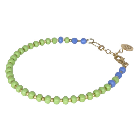 The Mint + Periwinkle HAPPY Bracelet features vibrant Czech glass beads and 14K gold-filled accents, adding a playful yet elegant touch to your jewelry collection.